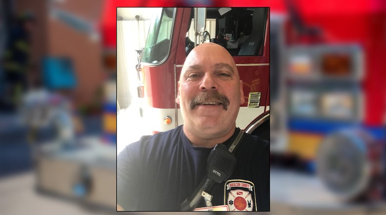 Haralson County firefighter Justin Robinson died after suffering a heart attack while working to get injured patients out of a car crash.