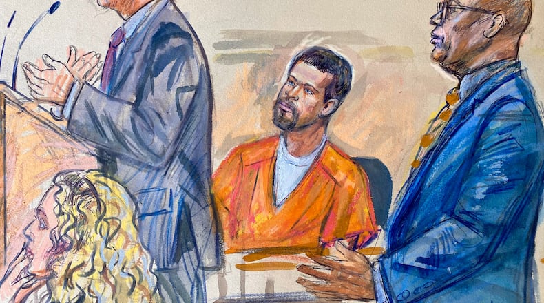 This courtroom sketch depicts Cole Tomas Allen, center, listening as his attorney Eugene Ohm, left, speaks to U.S. Magistrate Judge Zia Faruqui, Monday, May 4, 2026, in Washington, as Tony Towns, the acting general counsel for the District of Columbia Department of Corrections, listens at right. (Dana Verkouteren via AP)