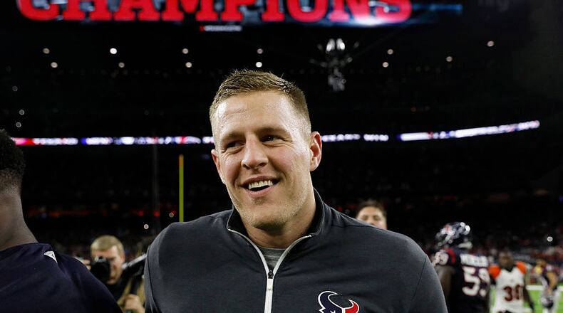 J.J. Watt #99 of the Houston Texans celebrates after the game between the Houston Texans and the Cincinnati Bengals at NRG Stadium on December 24, 2016 in Houston, Texas. (Photo by Tim Warner/Getty Images)