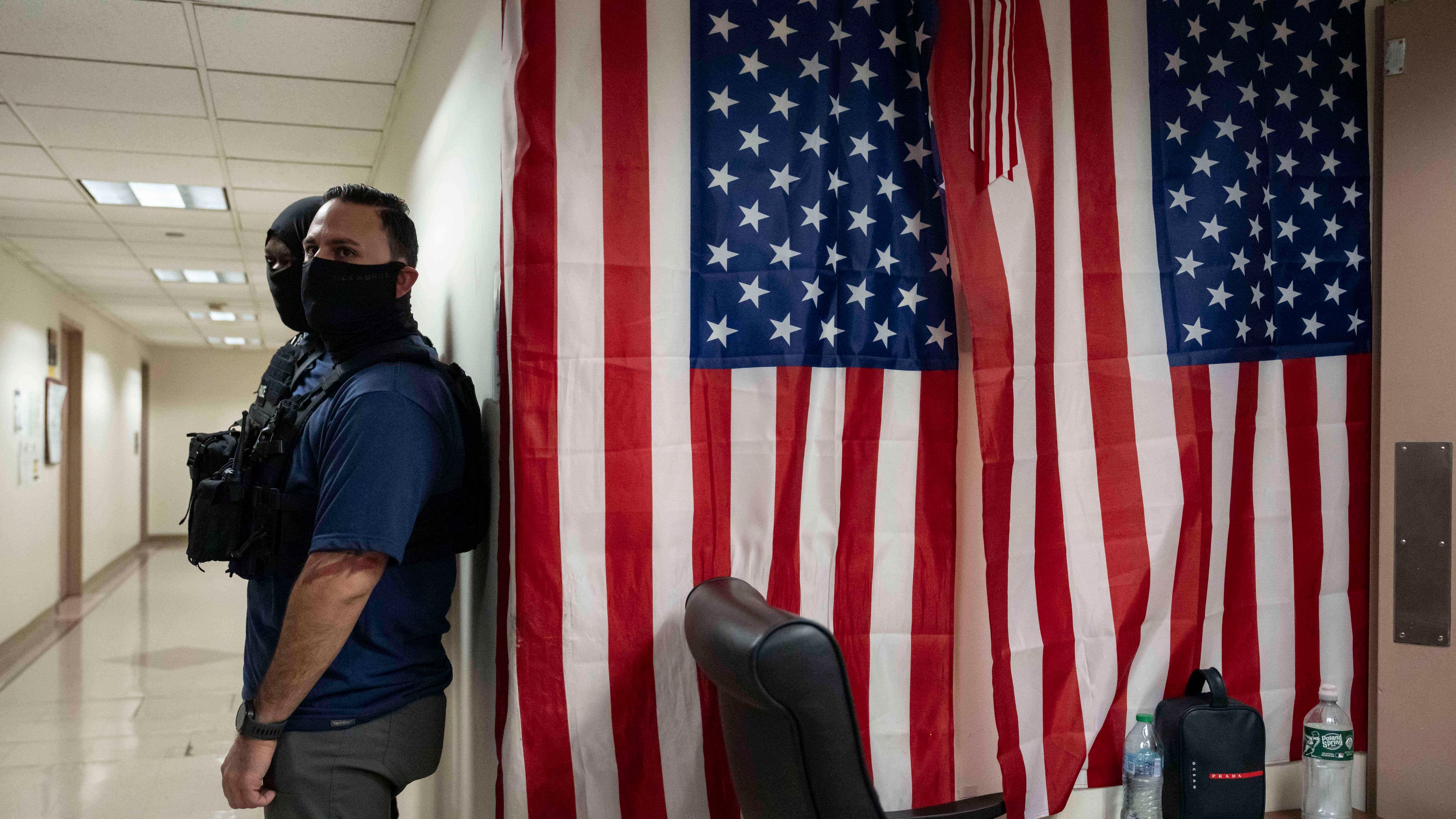 Federal agents stand outside an immigration court at the Jacob K. Javits federal building in New York, Wednesday, Sept. 17, 2025. (AP Photo/Yuki Iwamura)