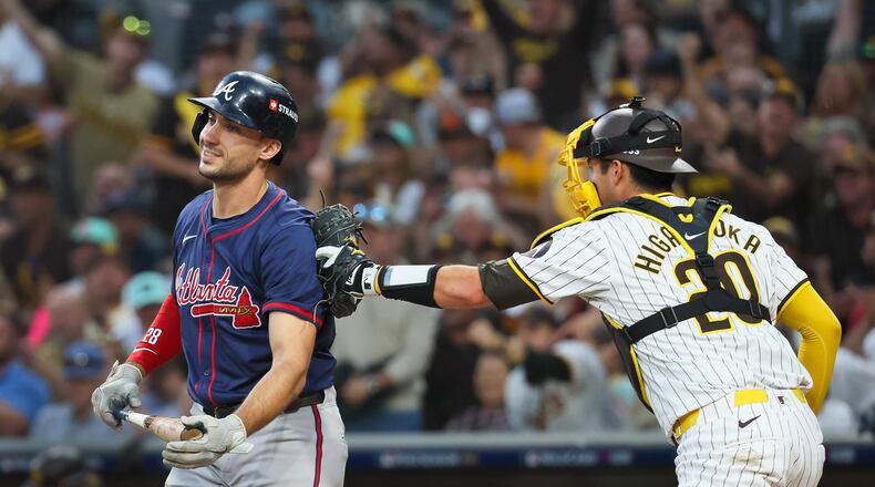 Atlanta Braves’ Matt Olson (28) strikes out and tagged by San Diego Padres catcher Kyle Higashioka (20) during the third inning of National League Division Series Wild Card Game One at Petco Park in San Diego on Tuesday, Oct. 1, 2024. (Jason Getz / Jason.Getz@ajc.com)