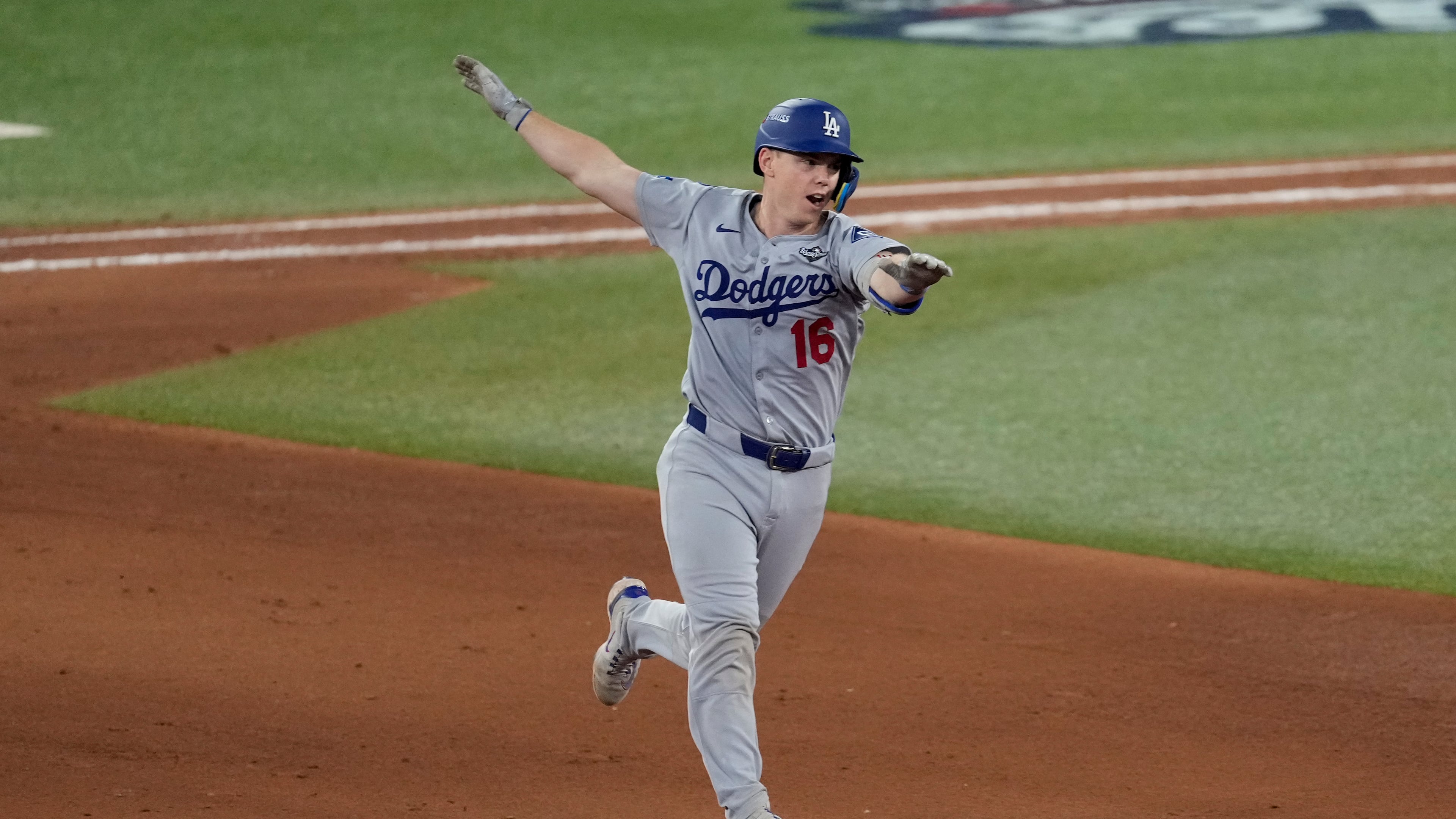 Los Angeles Dodgers' Will Smith celebrates his home run against the Toronto Blue Jays during the 11th inning in Game 7 of baseball's World Series, Sunday, Nov. 2, 2025, in Toronto. (AP Photo/Ashley Landis)