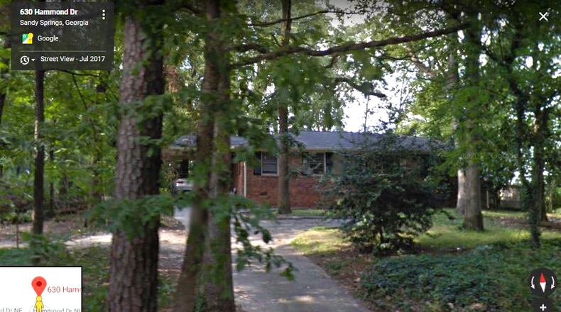 Sandy Springs is paying $540,000 for this house and its 0.8-acre lot at 630 Hammond Drive for a future widening of the street. GOOGLE MAPS
