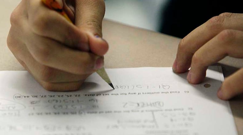 State Board of Education members reversed course Thursday and decided to reduce the impact of the Georgia Milestones tests. A vote on the measure is scheduled for December.