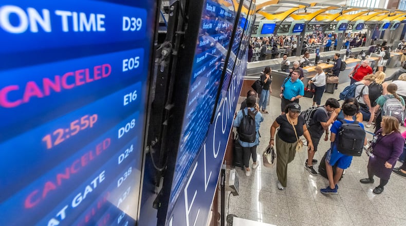 Canceled flights on Delta’s boards greeted fliers as a massive outage is affecting Microsoft users around the globe, disrupting airlines, railways, banks, stock exchanges and other businesses on July 19. (John Spink/AJC)