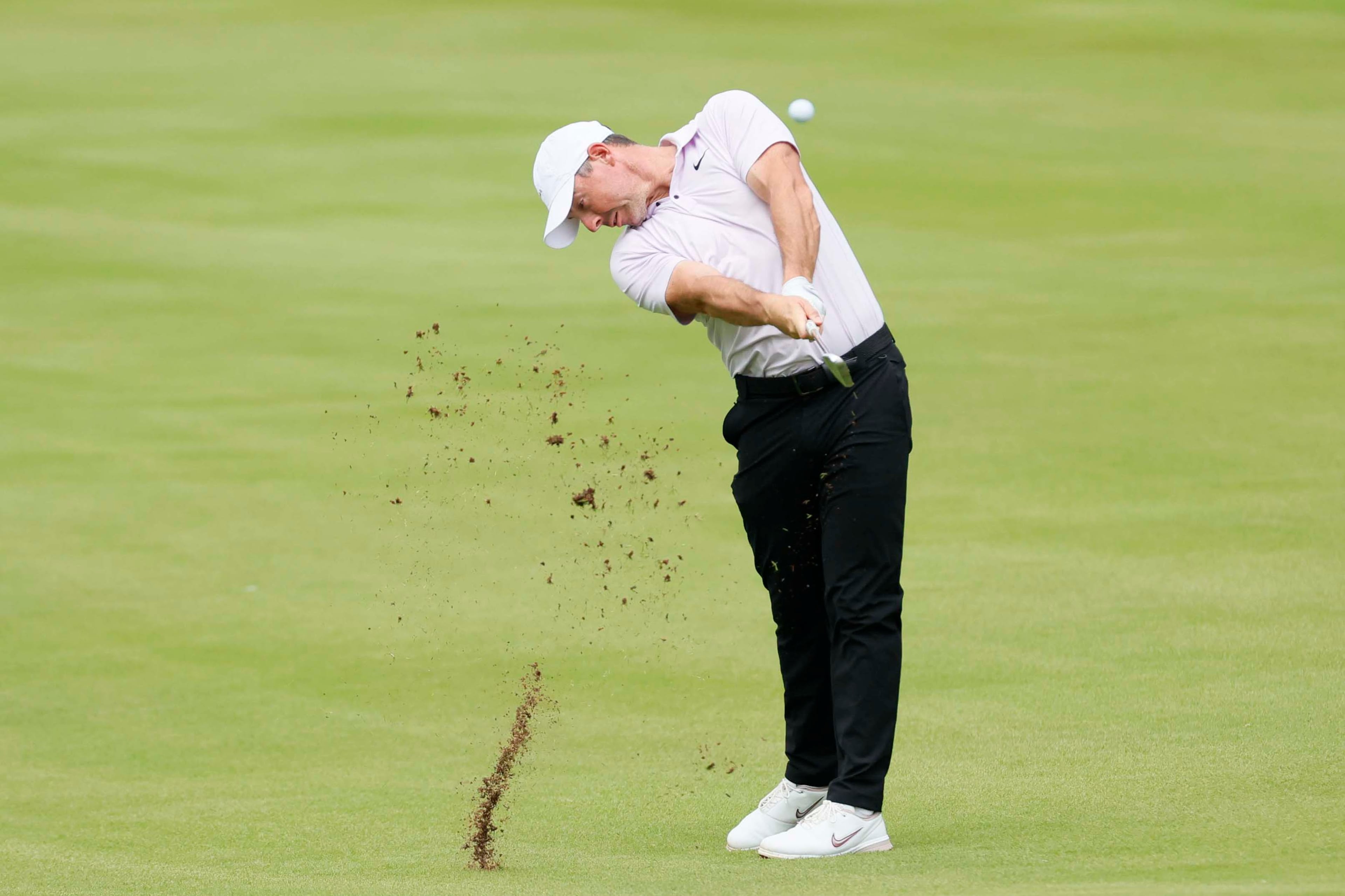 Rory McIlroy, of Northern Ireland, hits a shot from the first fairway during the final round of the PGA Tour Championship at East Lake Golf Club on Sunday, Aug. 24, 2025, in Atlanta. (Miguel Martinez/ AJC)