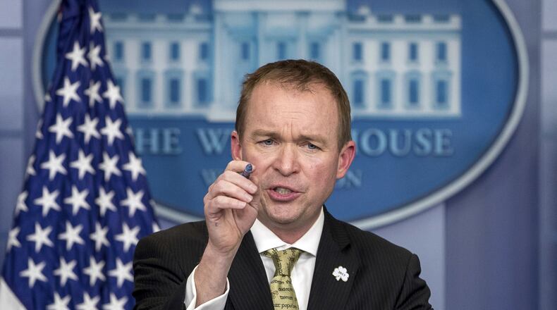 White House budget director Mick Mulvaney speaks at the White House in March. He said recently that Barack Obama, Hillary Clinton and Chuch Schumer had voted in favor of a wall along the U.S.Mexico border. (AP Photo/Andrew Harnik, file)