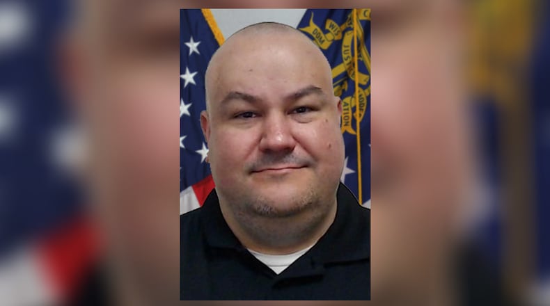 Correctional Officer Robert Clark, 42, was escorting two inmates from a dining hall when one assaulted him from behind with a homemade weapon.
