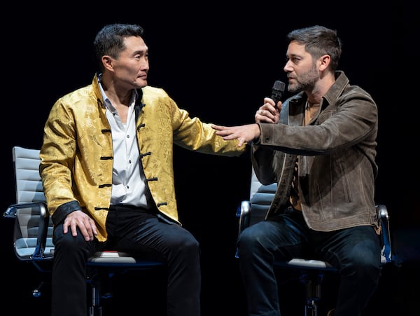 This image released by Polk & Co. shows Daniel Dae Kim, left, and Ryan Eggold during a performance of "Yellow Face on Broadway," a play by David Henry Hwang, in New York. (Joan Marcus/Polk & Co. via AP)