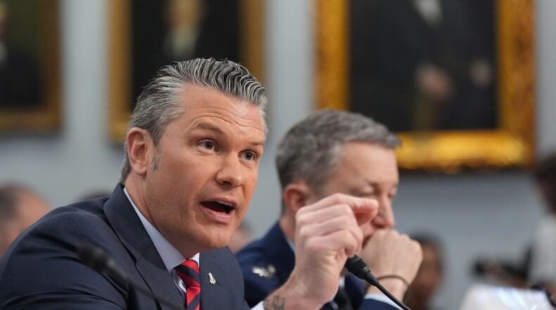 Defense Secretary Pete Hegseth testifies at a House Appropriations subcommittee budget hearing for the Department of Defense, Tuesday, May 12, 2026, in Washington, as Chairman of the Joint Chiefs of Staff Gen. Dan Caine listens. (AP Photo/Alex Brandon)