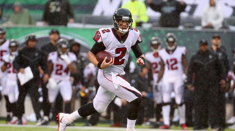 EAST RUTHERFORD, NJ - OCTOBER 29:  Quarterback Matt Ryan #2 of the Atlanta Falcons runs the ball against the New York Jets during the first half of the game at MetLife Stadium on October 29, 2017 in East Rutherford, New Jersey.  (Photo by Al Bello/Getty Images)