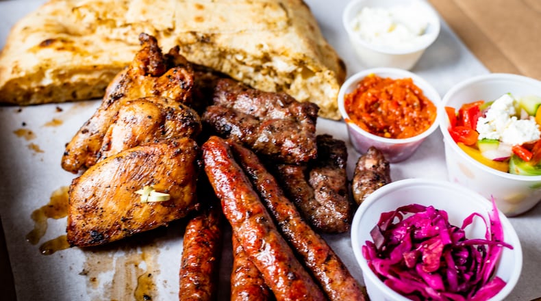 A familiar format — grilled meat, bread and toppings — sings with unique Balkan flavors during chef Adi Komic's Bosnian Grill Saturdays at Best End Brewing. Henri Hollis for The Atlanta Journal-Consititution