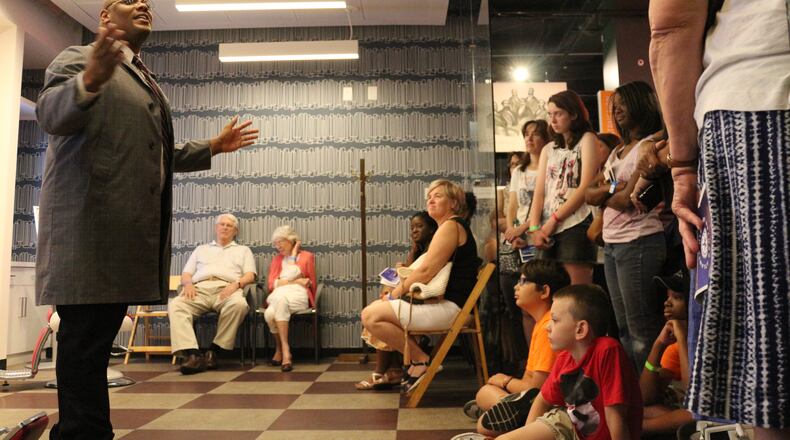 Atlanta barber-turned-insurance-magnate Alonzo Herndon (portrayed by Morris Hill in a Meet the Past museum theatre performance) appears in the Atlanta History Center exhibition "Gatheround: Stories of Atlanta." The exhibition, which includes information, artifacts and performances relating to the civil rights movement, is a main attraction during a thought-provoking day of free History Center programming on Martin Luther King Jr. Day. CONTRIBUTED BY ATLANTA HISTORY CENTER