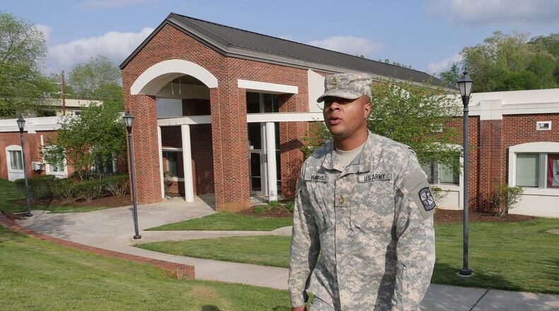 Dante Harris leaves the Military Leadership Center on University of North Georgia Dahlonega Campus. He is now facing suspension and the possible loss of a $70,000 scholarship, as well as a felony charge and a misdemeanor charge. HYOSUB SHIN / HSHIN@AJC.COM