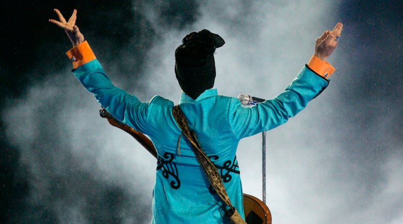 In this Feb. 4, 2007 file photo, Prince performs during the halftime show at Super Bowl XLI Photo: AP
