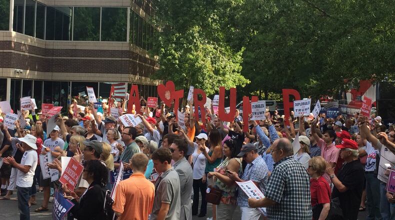 Hundreds of Donald Trump supporters rallied at the opening of his campaign's new Sandy Springs office. Special.