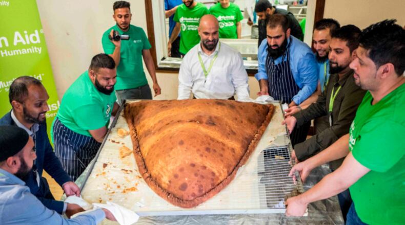 At an East London mosque, volunteers with the Muslim Aid UK charity broke the Guinness World Record for the largest samosa to ever be created.
