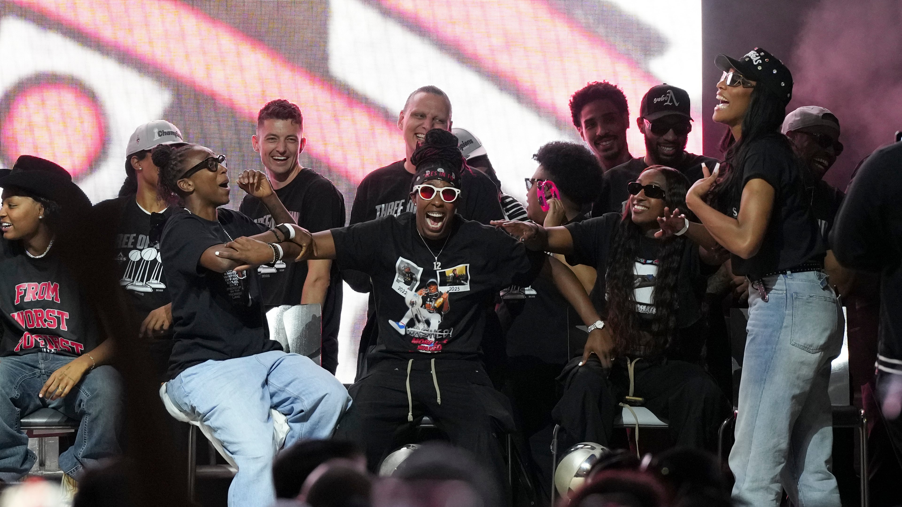 The Las Vegas Aces celebrate during a rally to celebrate the team's WNBA championship Friday, Oct. 17, 2025, in Las Vegas. (AP Photo/Candice Ward)