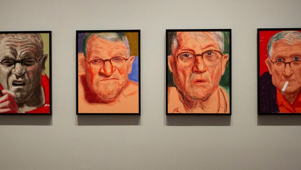 This Wednesday, June 21, 2017 photo shows David Hockney's self-portraits, iPad drawings printed on paper, are on display at the Getty Center in Los Angeles. (Courtesy of Getty Center via AP)