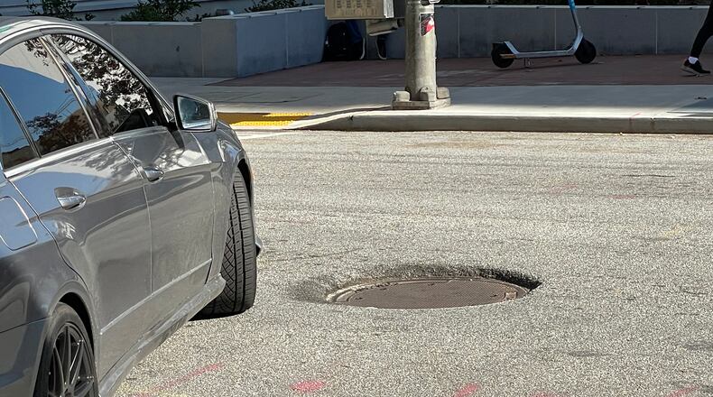 Ken Rice wants the manhole covers in downtown leveled.