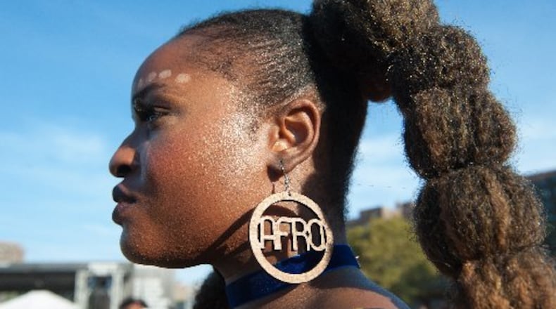 People participate in the annual Afropunk Music festival on August 27, 2016 in New York City. The festival comes to Atlanta Oct. 14 and leaves Oct. 16. (Credit: Stephanie Keith/Getty Images)