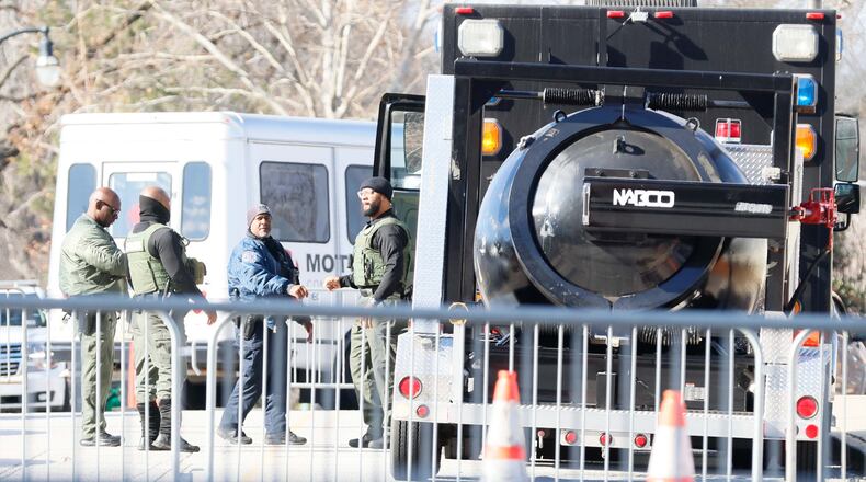 Atlanta police guard the area surrounding the Mercedes-Benz Stadium for the Chick-fil-A Peach Bowl on Wednesday, January 1, 2025, in Atlanta.
(Miguel Martinez / AJC)
