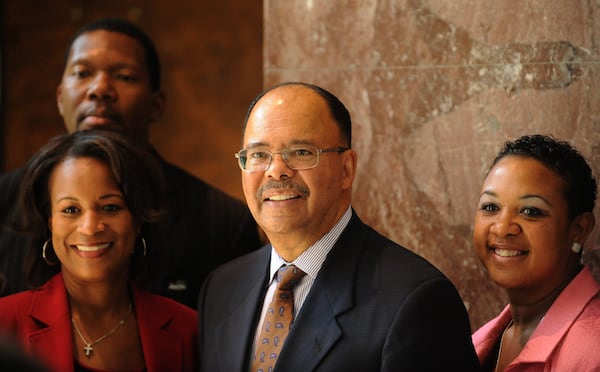 Interim Atlanta Public Schools Superintendent Erroll Davis (center) is shown with ( back row) Nelson Render, APS College & Readiness; (left) Lori A. Manns, CEO of Quality Media Consultant Group and Tasha Brimmer Taylor, APS College & Readiness, during  the Youth Justice Summit  sponsored by the U.S. Attorney's office at Georgia State University. The event introduced 225 high school students to  the law through a crime scene and mock trial.  (Johnny Crawford/AJC)
