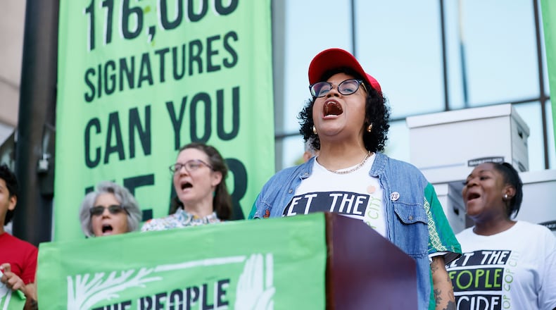 Opponents of the Atlanta Public Safety Training Center presented a petition with thousands of signatures to the city last year. (Miguel Martinez/miguel.martinezjimenez@ajc.com)