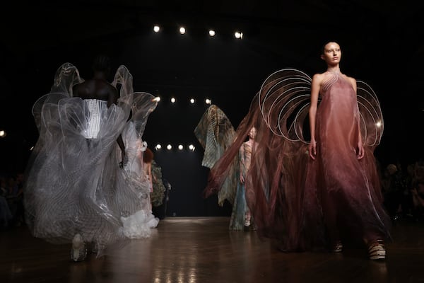 A model wears a creation as part of the Iris van Herpen Fall-Winter 2025/26 Haute Couture collection presented Monday, July 7, 2025, in Paris. (AP Photo/Tom Nicholson)