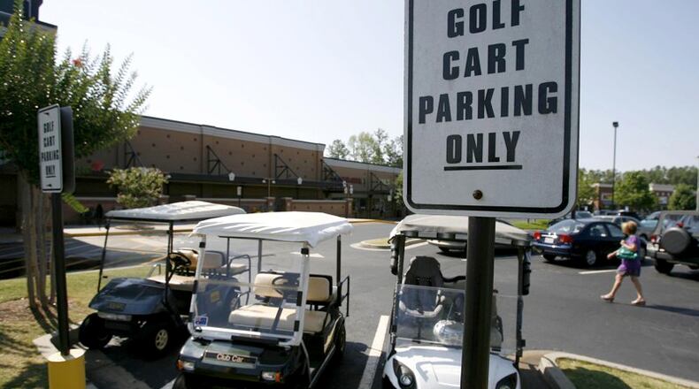 “Personal transportation vehicles,” or golf carts, are now legal — with restrictions — on certain Milton streets under an ordinance adopted by the City Council. AJC FILE