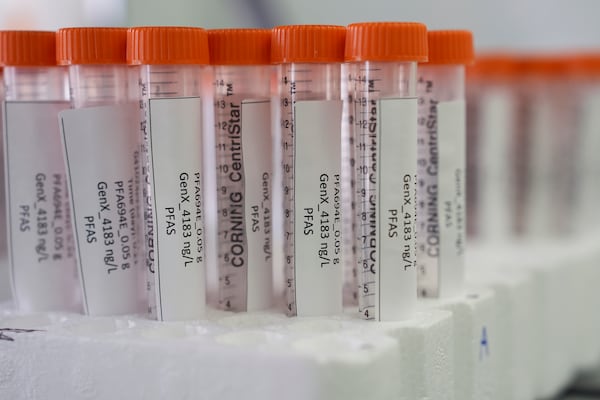 FILE - Vials containing PFAS samples sit in a tray, April 10, 2024, at a U.S. Environmental Protection Agency lab in Cincinnati. (AP Photo/Joshua A. Bickel, File)