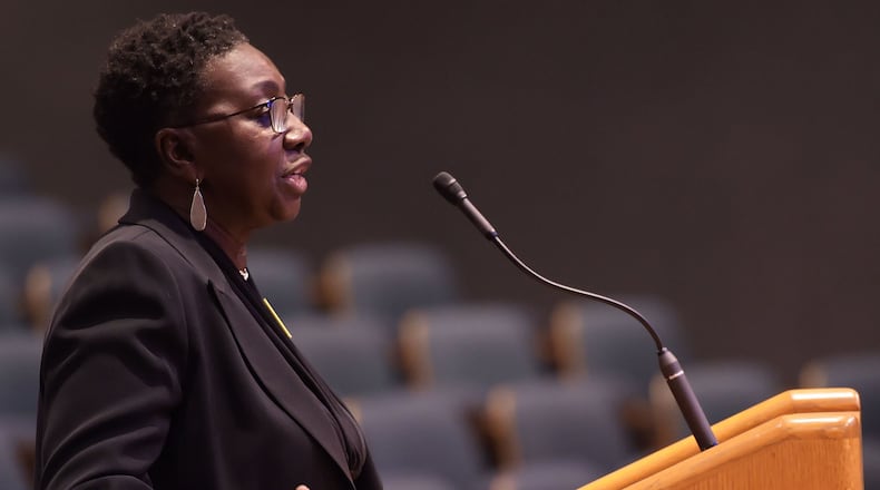 During an Aug. 1 meeting, Penny Poole, president of the Gwinnett NAACP, tells the Gwinnett Board of Commissioners that the county’s transit referendum should be held in November, not in March. JENNA EASON / JENNA.EASON@COXINC.COM