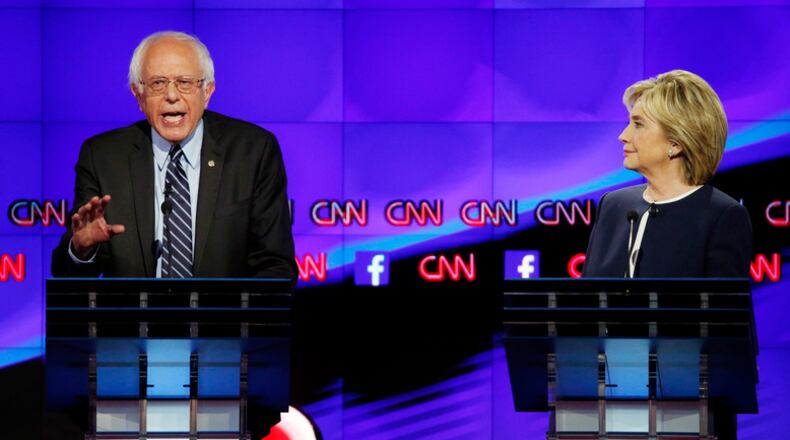 Bernie Sanders and Hillary Clinton at a 2015 debate. (AP Photo/John Locher)
