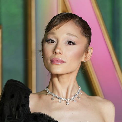 FILE - Ariana Grande poses for photographers upon arrival at the premiere of the film "Wicked For Good" in London, Nov. 10, 2025. (Photo by Scott A Garfitt/Invision/AP, File)