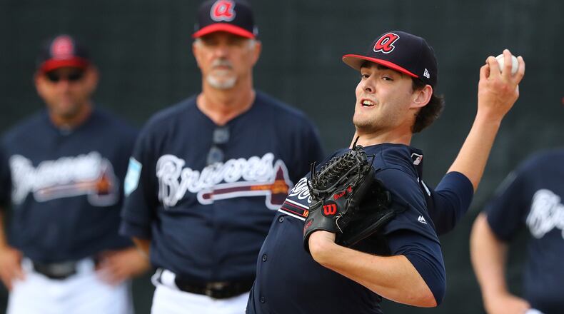 Atlanta Braves new pitching coach Rick Kranitz watches pitcher Ian Anderson work in the bullpen during spring training at the ESPN Wide World of Sports Complex on Wednesday, Feb. 20, 2019, in Lake Buena Vista. Curtis Compton/ccompton@ajc.com