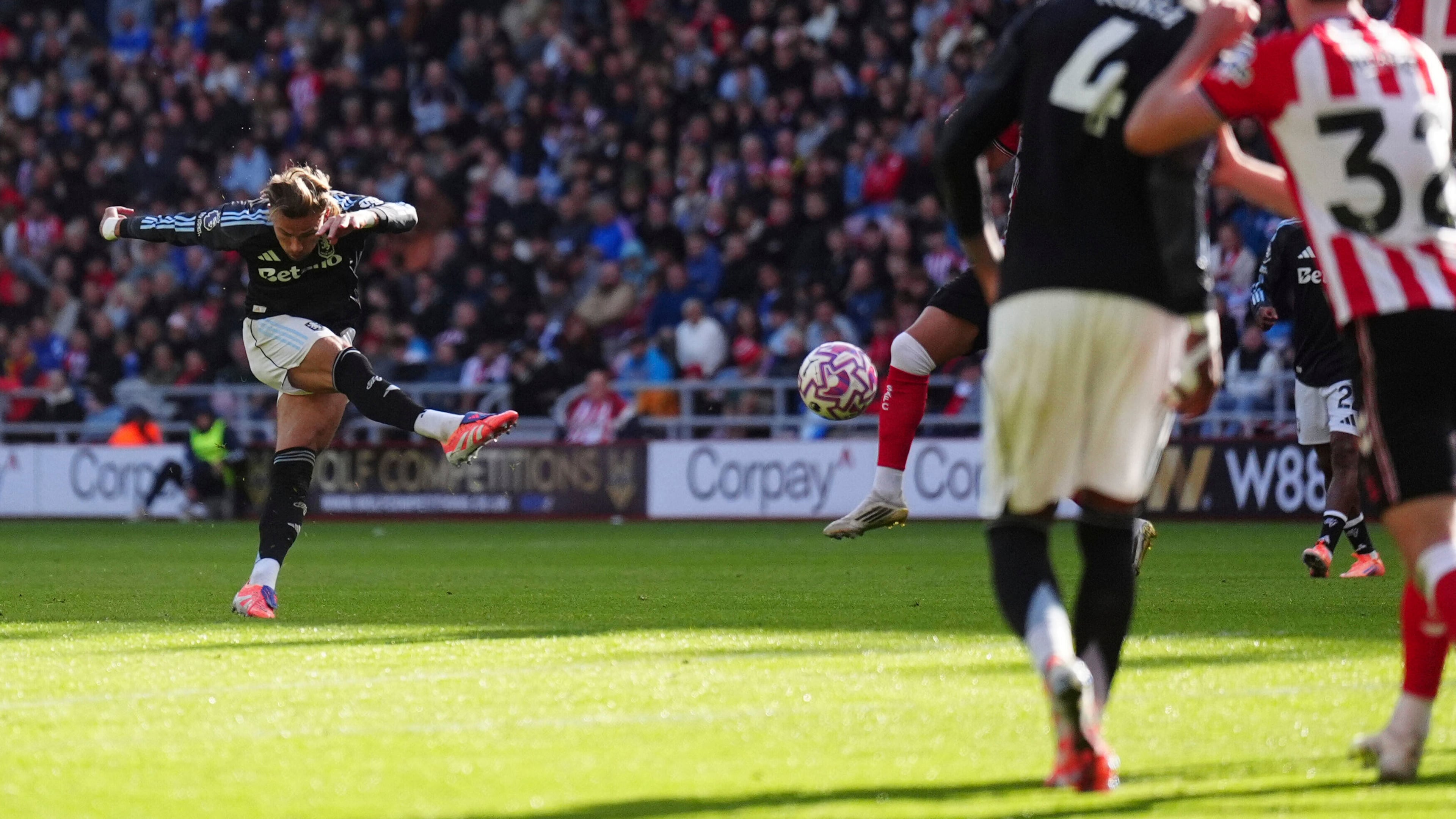 Aston Villa's Matty Cash scores his side's first goal of the game during the English Premier League soccer match between Sunderland and Aston Villa at the Stadium of Light, in Sunderland, England, Sunday Sept. 21, 2025. (Owen Humphreys/PA via AP)