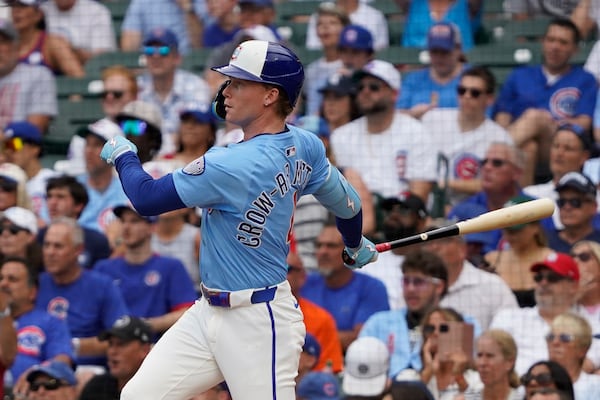 Chicago Cubs' Pete Crow-Armstrong hits a home run against the St. Louis Cardinals during the first inning of a baseball game Friday, July 4, 2025, in Chicago. (AP Photo/David Banks)