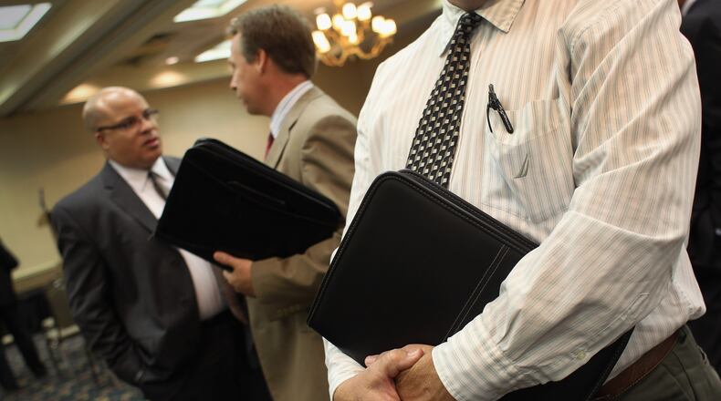 WESTMINSTER, CO - JULY 20: Coloradans wait to meet potential employers at a sales and management career fair on July 20, 2011 in Westminster, Colorado. The job fair, organized by United Career Fairs, featured a dozen potential employers looking to hire sales representatives and managers. (Photo by John Moore/Getty Images)