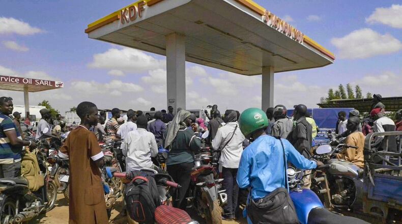 People queue with their motorcycles at a gas station amid a fuel shortage in Bamako Mali, Tuesday, Oct 7, 2025 (AP Photo)