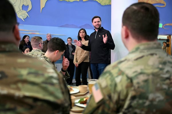 Vice President JD Vance, from right, and second lady Usha Vance speak with soldiers at Pituffik Space Base in Greenland, Friday, March 28, 2025. (Jim Watson/Pool via AP)
