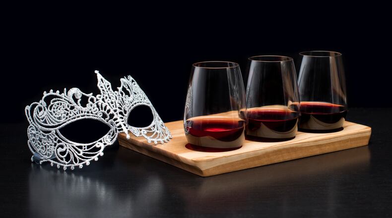 A three-wine flight is $12 at Zinburger. HANDOUT / 150PR.