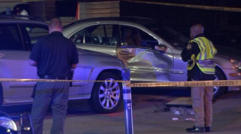 A woman was killed and five other people were hurt when a valet forgot to put a car in park. (Credit: Channel 2 Action News)