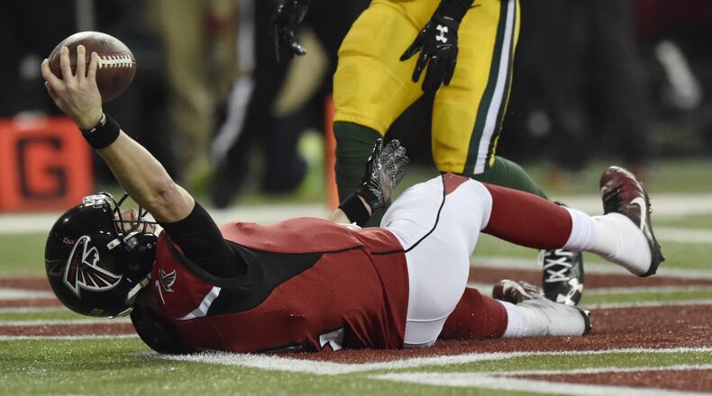 Falcons quarterback Matt Ryan scores during the NFC Championship game against the Packers in Atlanta, Georgia, on Sunday, Jan. 22, 2017. (DAVID BARNES / DAVID.BARNES@AJC.COM)