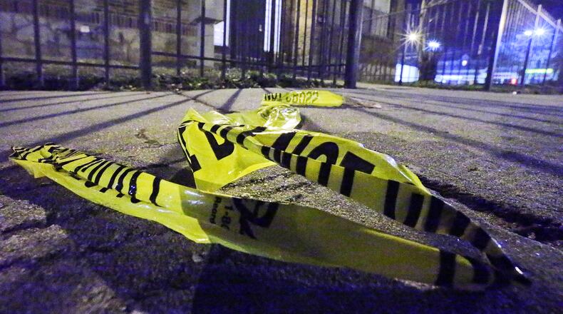 Detectives were still on the scene investigating some six hours after the shooting, which happened just before midnight Thursday. Channel 2 Action News reported that there were at least 68 evidence markers scattered throughout the area.