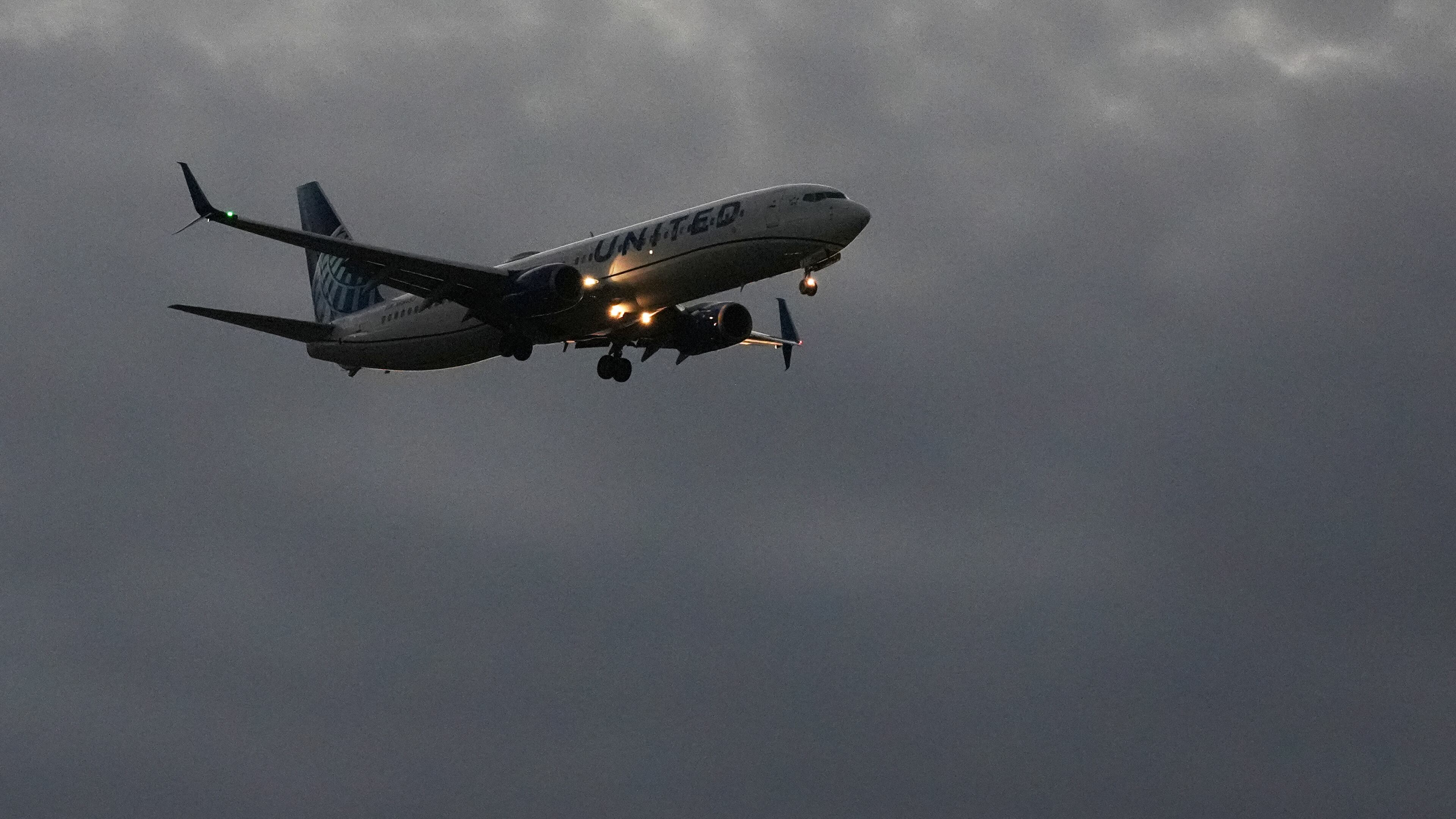 An United Airlines flight arrives at O'Hare International Airport in Chicago, Monday, Nov. 3, 2025. (AP Photo/Nam Y. Huh)