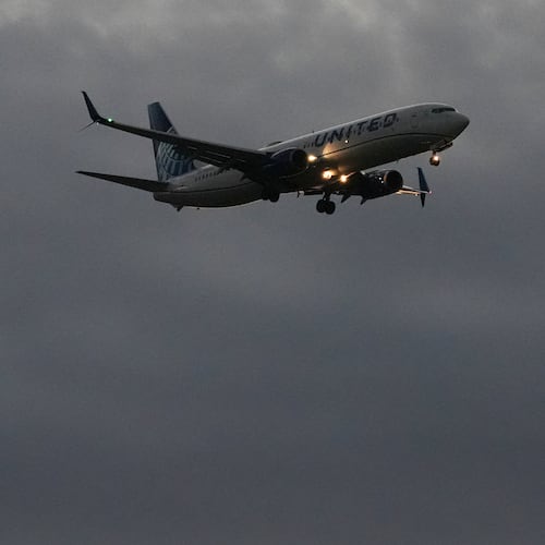 An United Airlines flight arrives at O'Hare International Airport in Chicago, Monday, Nov. 3, 2025. (AP Photo/Nam Y. Huh)