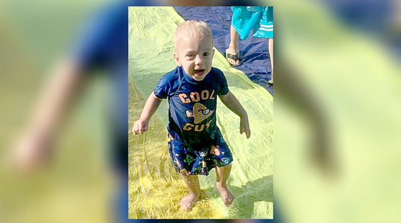 Oliver Sebastian Bell, 2, died Monday after being run over by his mother, according to the Long County sheriff.