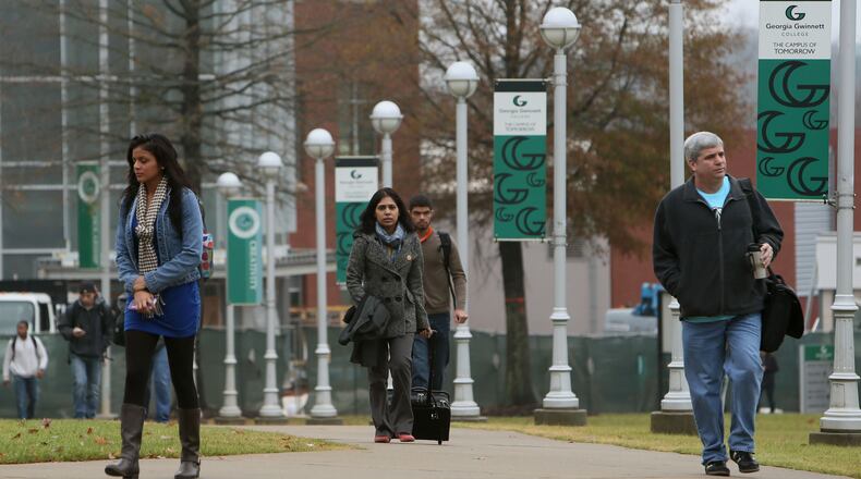 Students and others walk on the Georgia Gwinnett College campus in Lawrenceville on Dec. 3, 2013. BOB ANDRES / BANDRES@AJC.COM