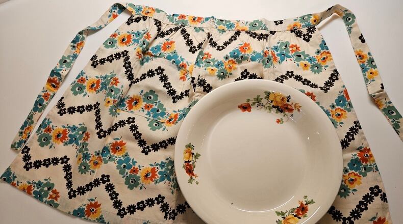 Sally Whaley Durrance sewed kitchen curtains, napkins, quilts and aprons for her granddaughters, using a fabric print that matched her everyday dishes. Courtesy of Julia Distelhurst