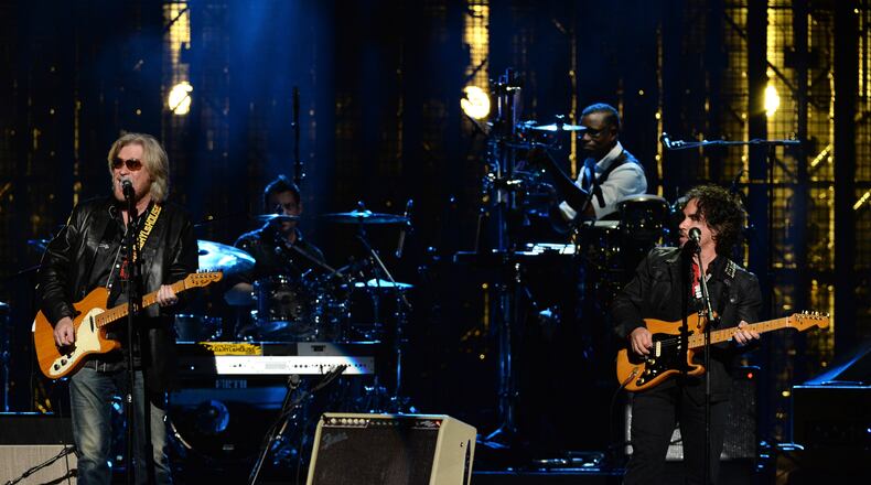 Inductees Hall and Oates perform onstage at the 29th Annual Rock And Roll Hall Of Fame Induction Ceremony at Barclays Center of Brooklyn on April 10, 2014 in New York City. (Photo by Larry Busacca/Getty Images) Hall and Oates are among the new names added to the Music Midtown lineup. Photo by Larry Busacca/Getty Images.